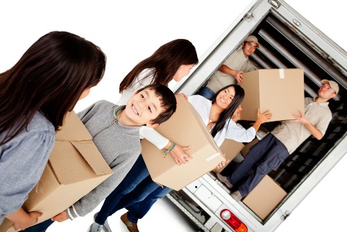 Removal team planning a move in Crystal Palace with boxes and furniture