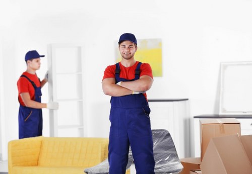 Careful wrapping of fragile household items during packing services