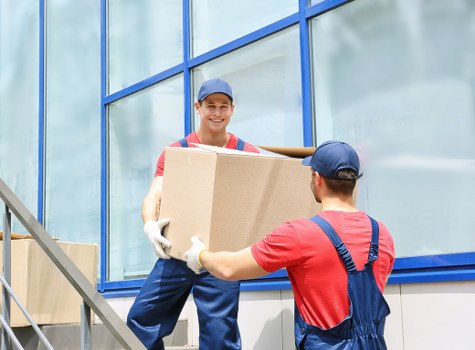 Professional furniture moving team handling a flat removal in Crystal Palace