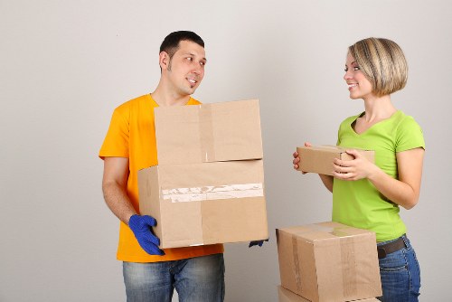 Professional movers loading household items for a Crystal Palace relocation